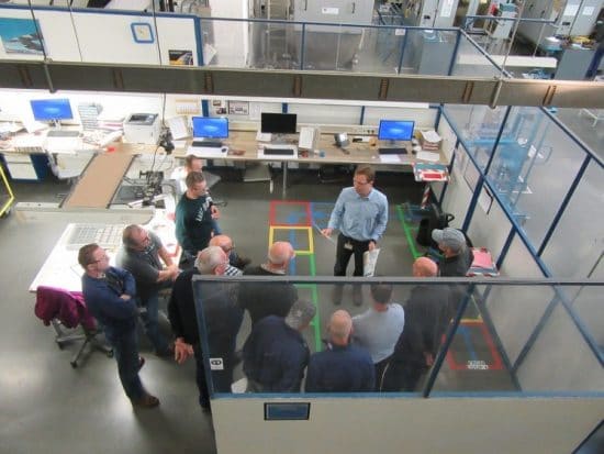 Institute for Operational Excellence trainer teaching on factory floor